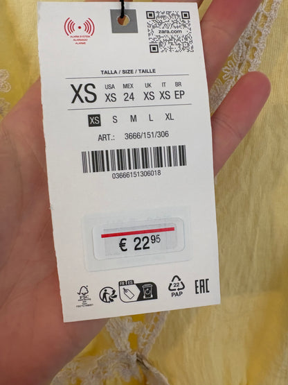 ZARA. Top amarillo pastel textura