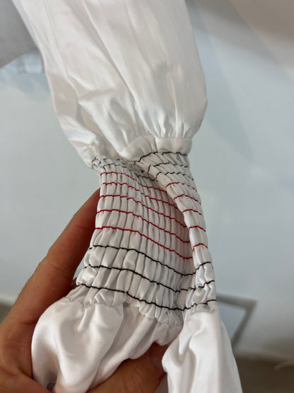 LAGANINI. Blusa blanca volante cuello T.s/m