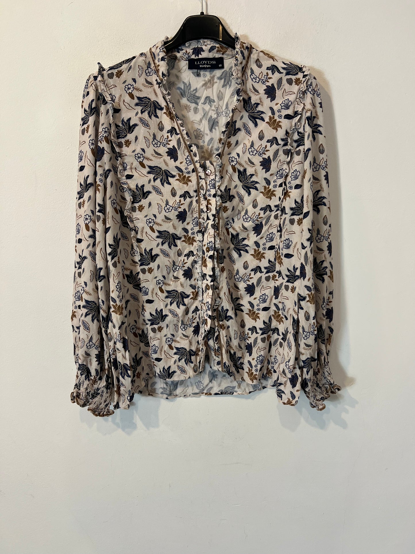 LLOYD´S. Blusa fluida estamapda
