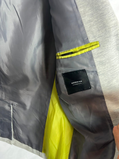 RESERVED. Heathered gray blazer with fluorescent details. TS