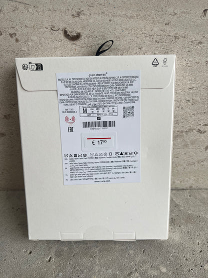 ZARA. Collar flor textura. T M