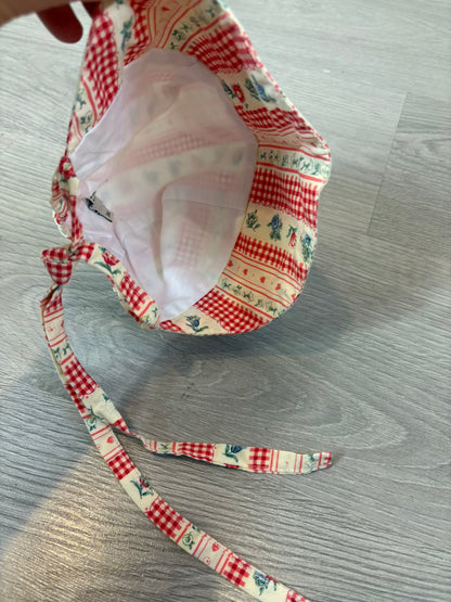 OMINI. Gorro/visera flores naranjas T. 3 meses