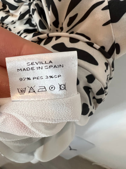 CHERUBINA. Long printed dress with gathered trim. TM