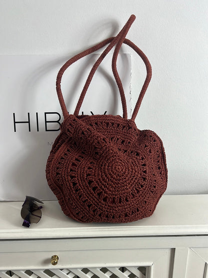 PIMKIE. Bolso rafia color teja redondo