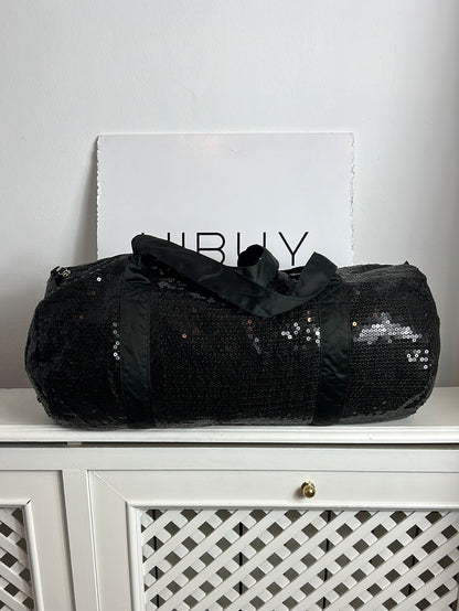 CALZEDONIA. Bolsa negra lentejuelas