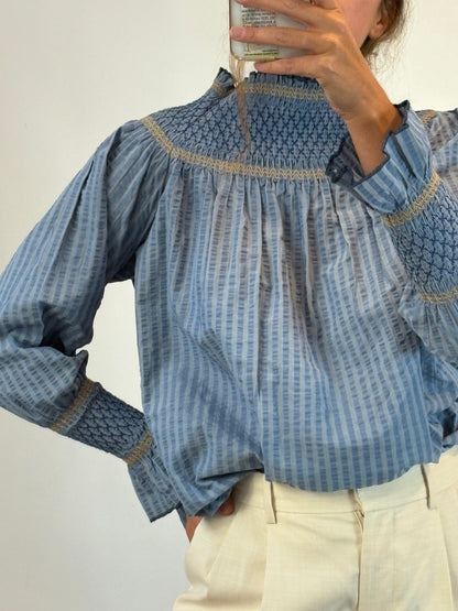 OTHERS. Blue blouse with honeycomb detail. TS
