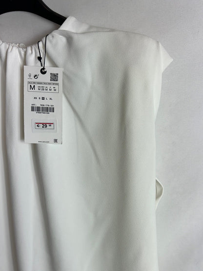 ZARA. Blusa blanca sin mangas hombreras. T S