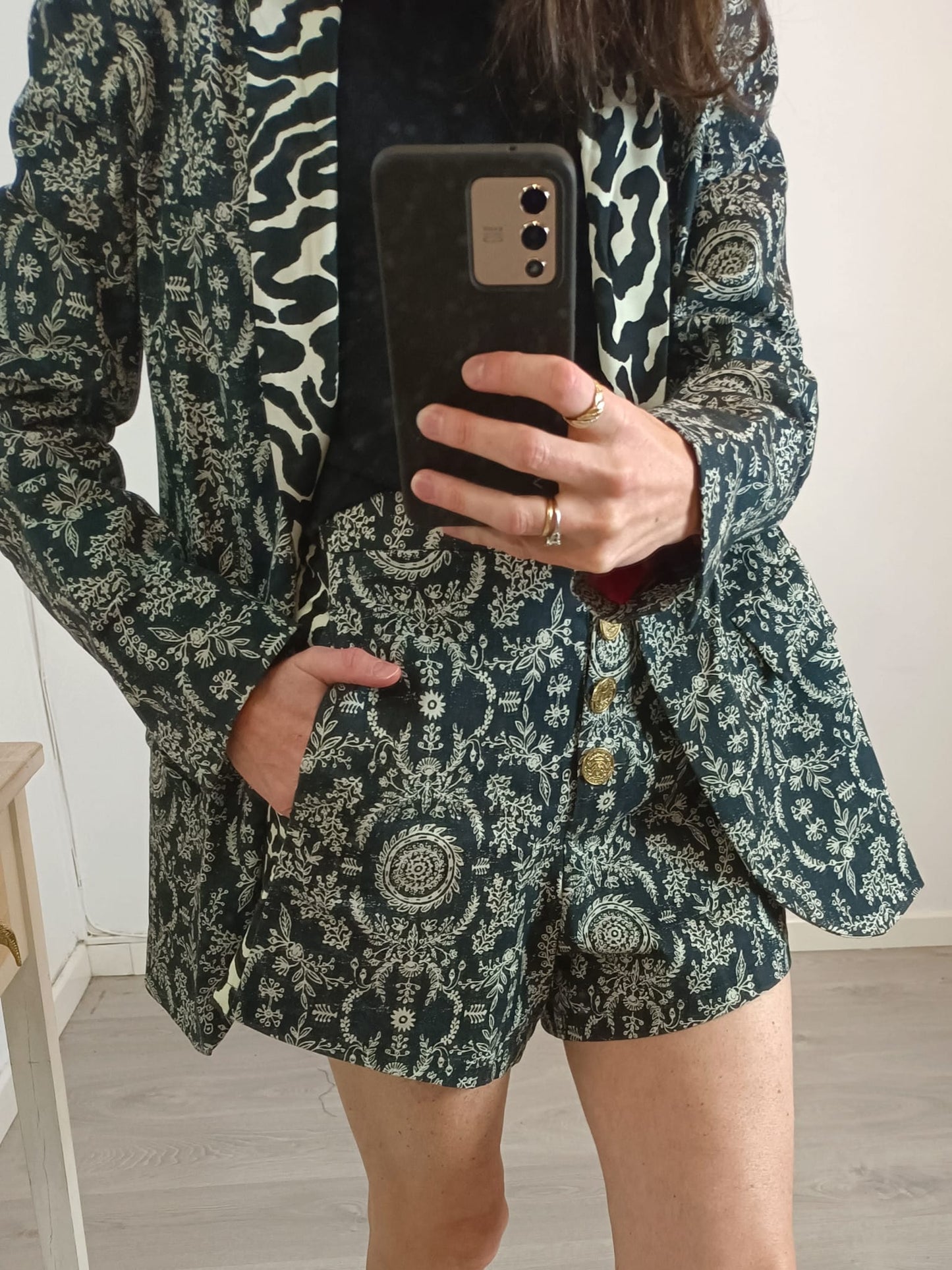 PINKO. Black printed shorts T.36