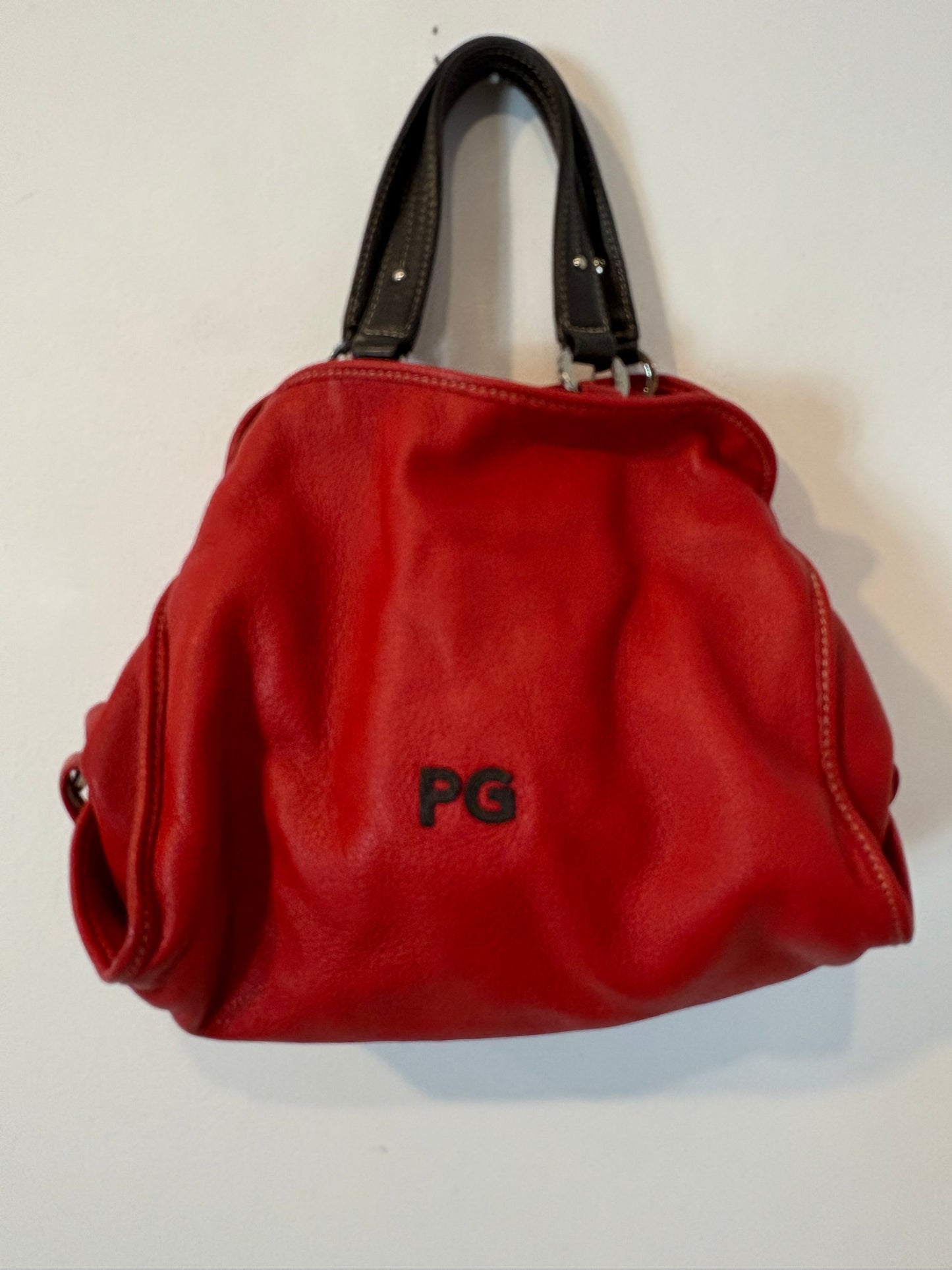 PURIFICACION GARCIA. Bolso de mano rojo