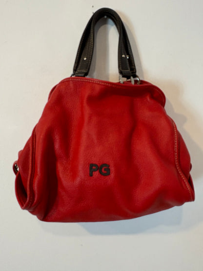 PURIFICACION GARCIA. Bolso de mano rojo