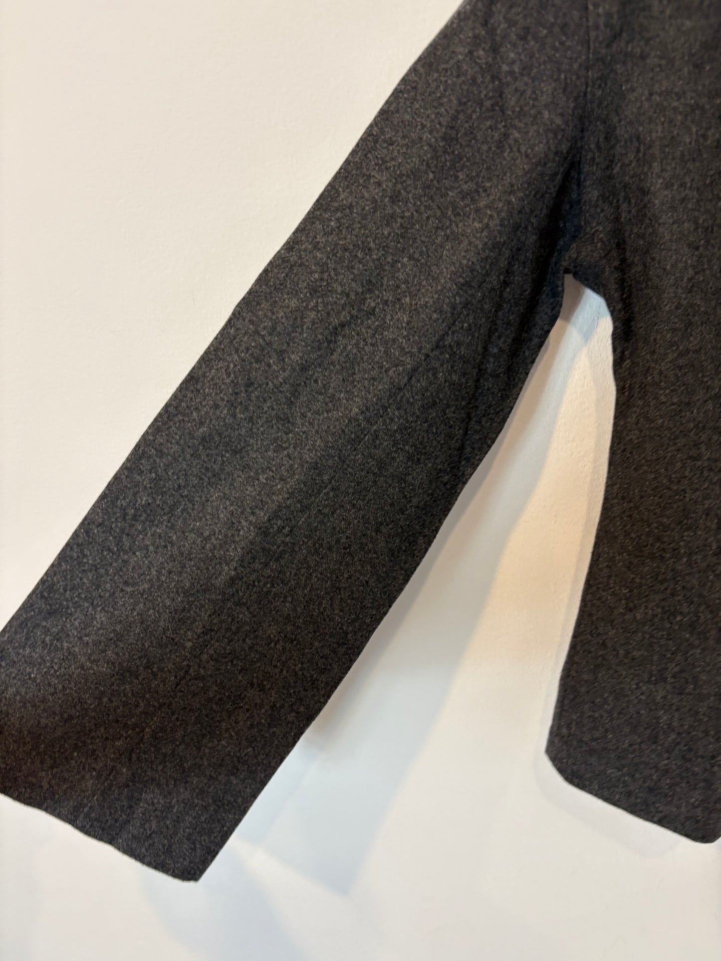 ZARA. Top gris fruncido con lana