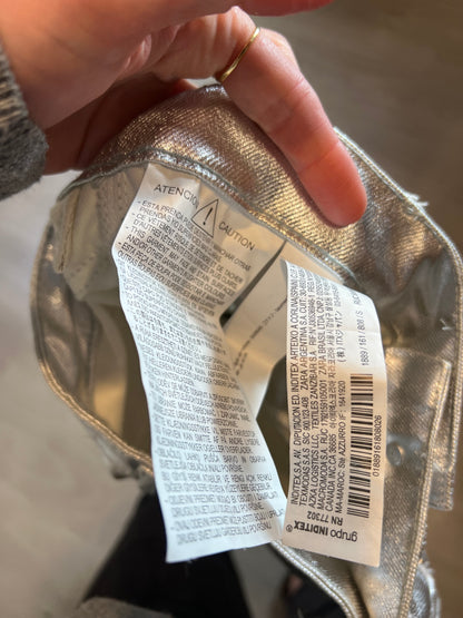 ZARA. Falda corta plateada T.s