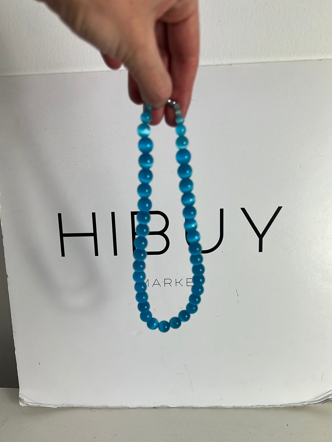 OTHERS. Blue boots necklace