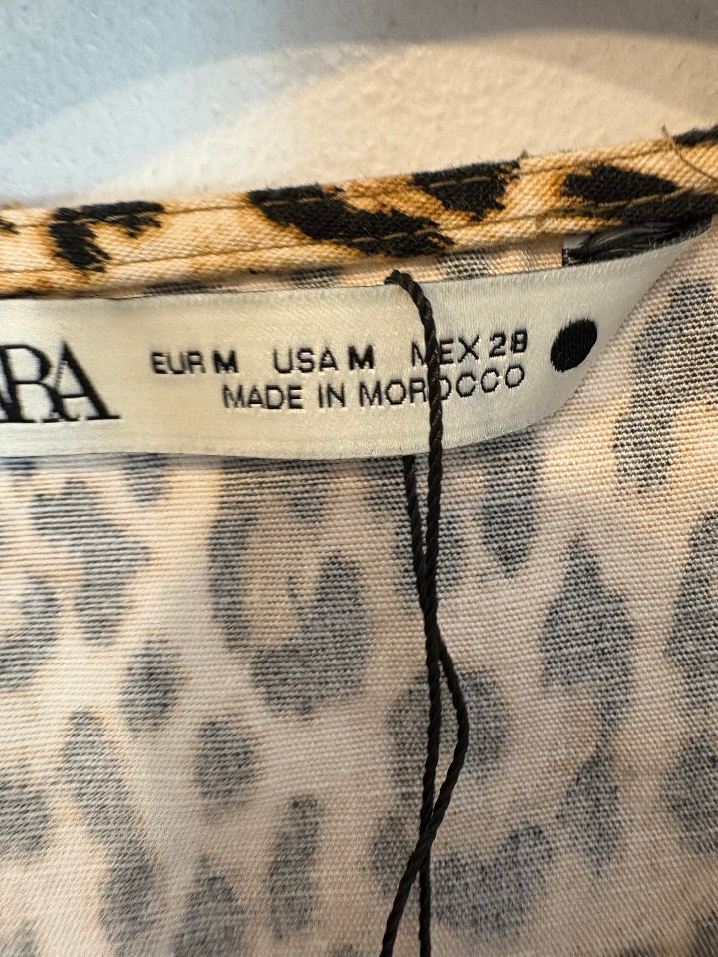 ZARA. Blusa animal print manga farol