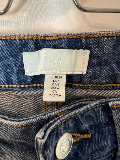 H&M.Pantalón campana claro  T.38
