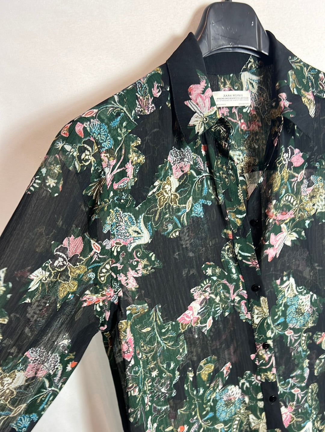 ZARA. Over a long, semi-sheer floral shirt. XS