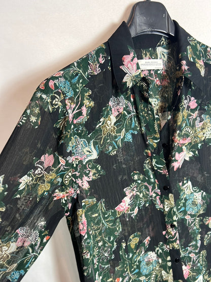 ZARA. Over a long, semi-sheer floral shirt. XS