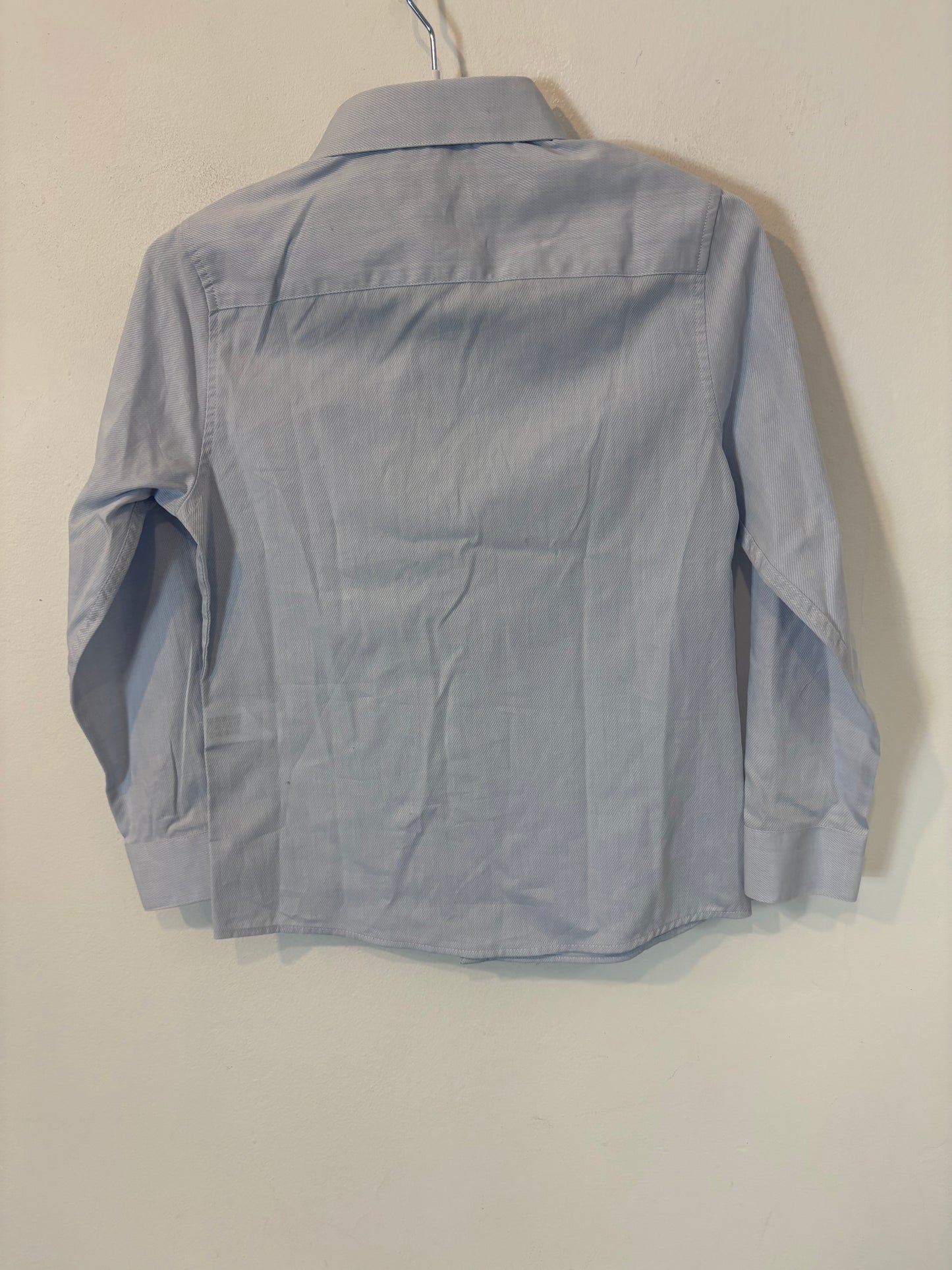 ZARA. Camisa clásica azul claro. T 7 años