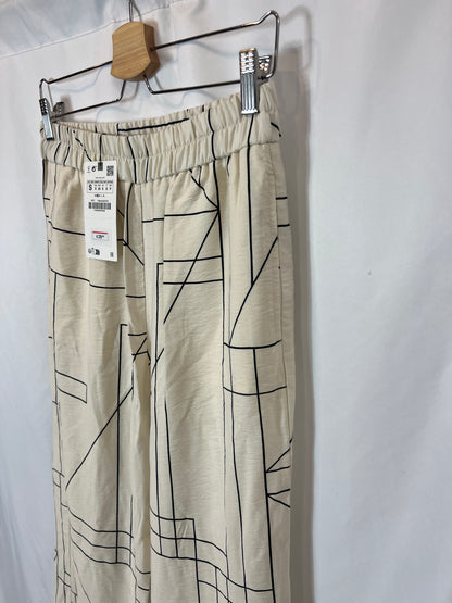 ZARA. Pantalón fluido beige estampado geométrico . T S