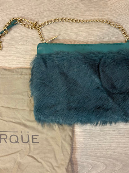UTERQÜE. Bolso azul turquesa oscuro textura