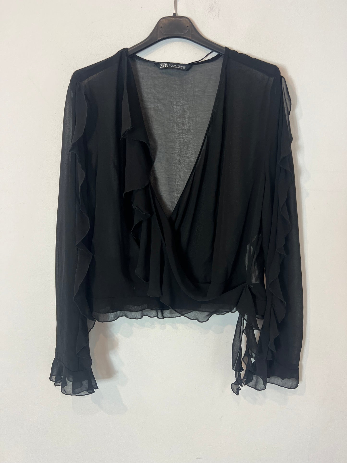 ZARA. Black semi-sheer top with ruffles. TL