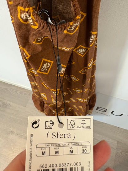 SFERA. Vestido largo estampado detalle espalda