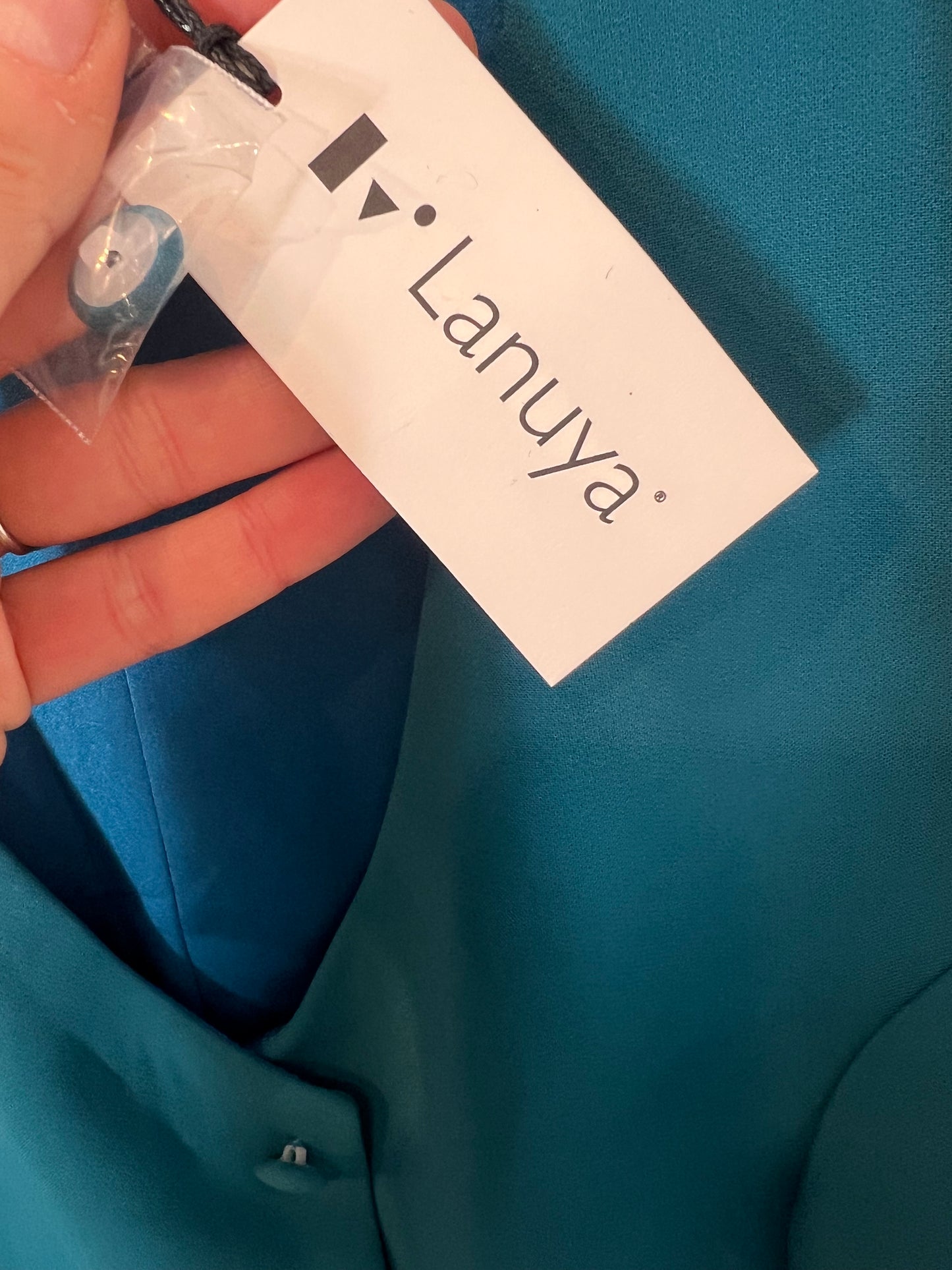 LANUYA. Chaleco azul botones T.42