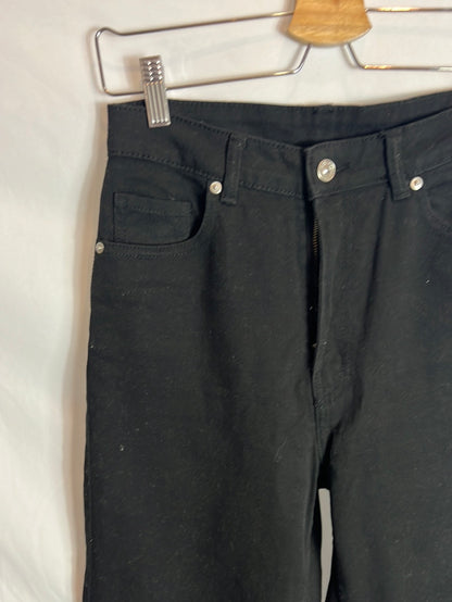 H&M. Denim pata ancha negro. T 36