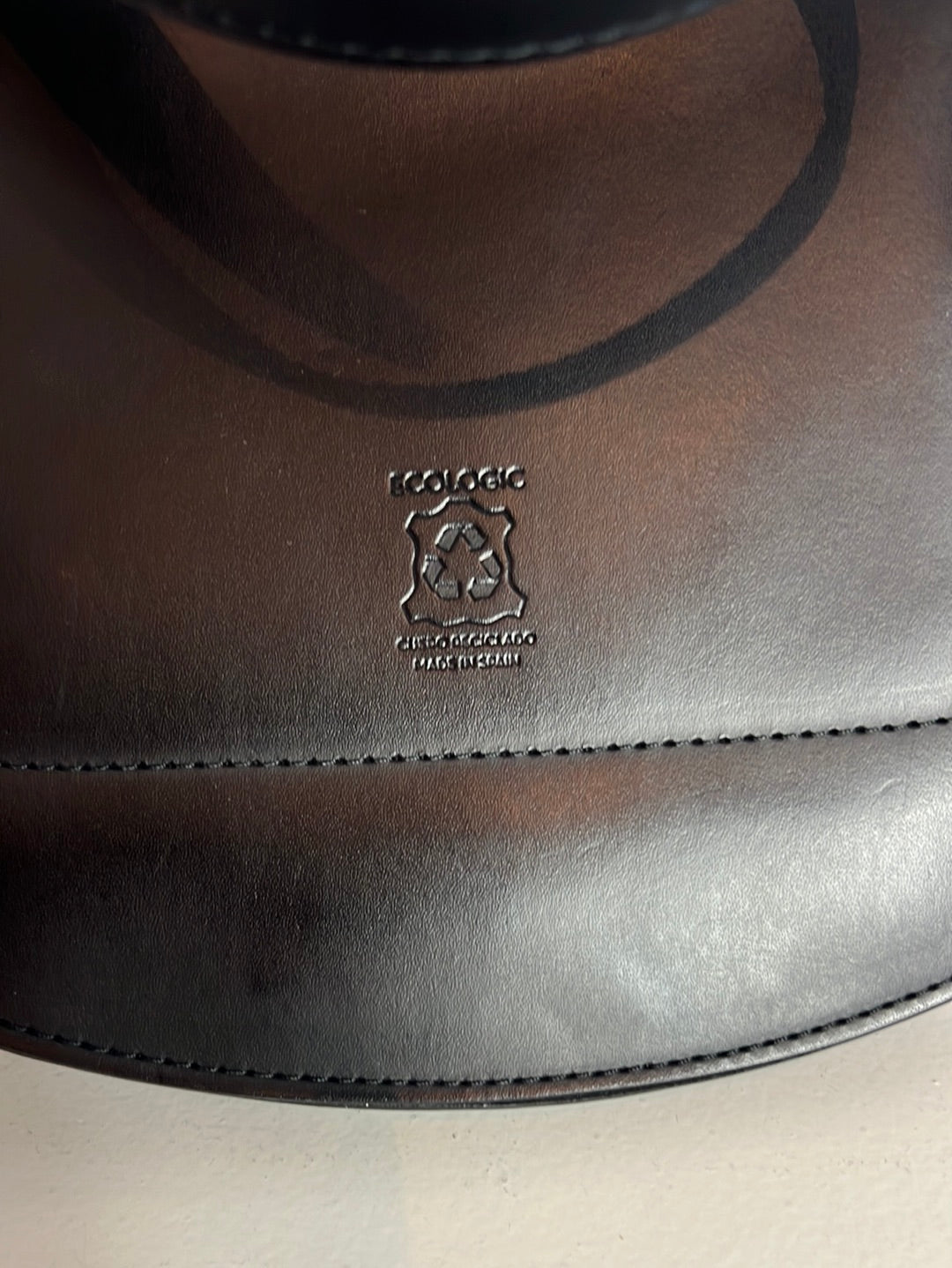 AMT. Flat black mini bag