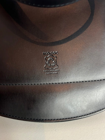 AMT. Flat black mini bag