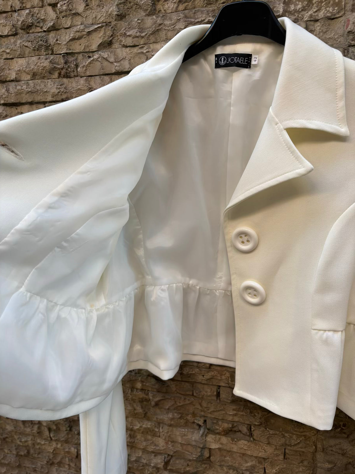 Chaqueta blanca botones