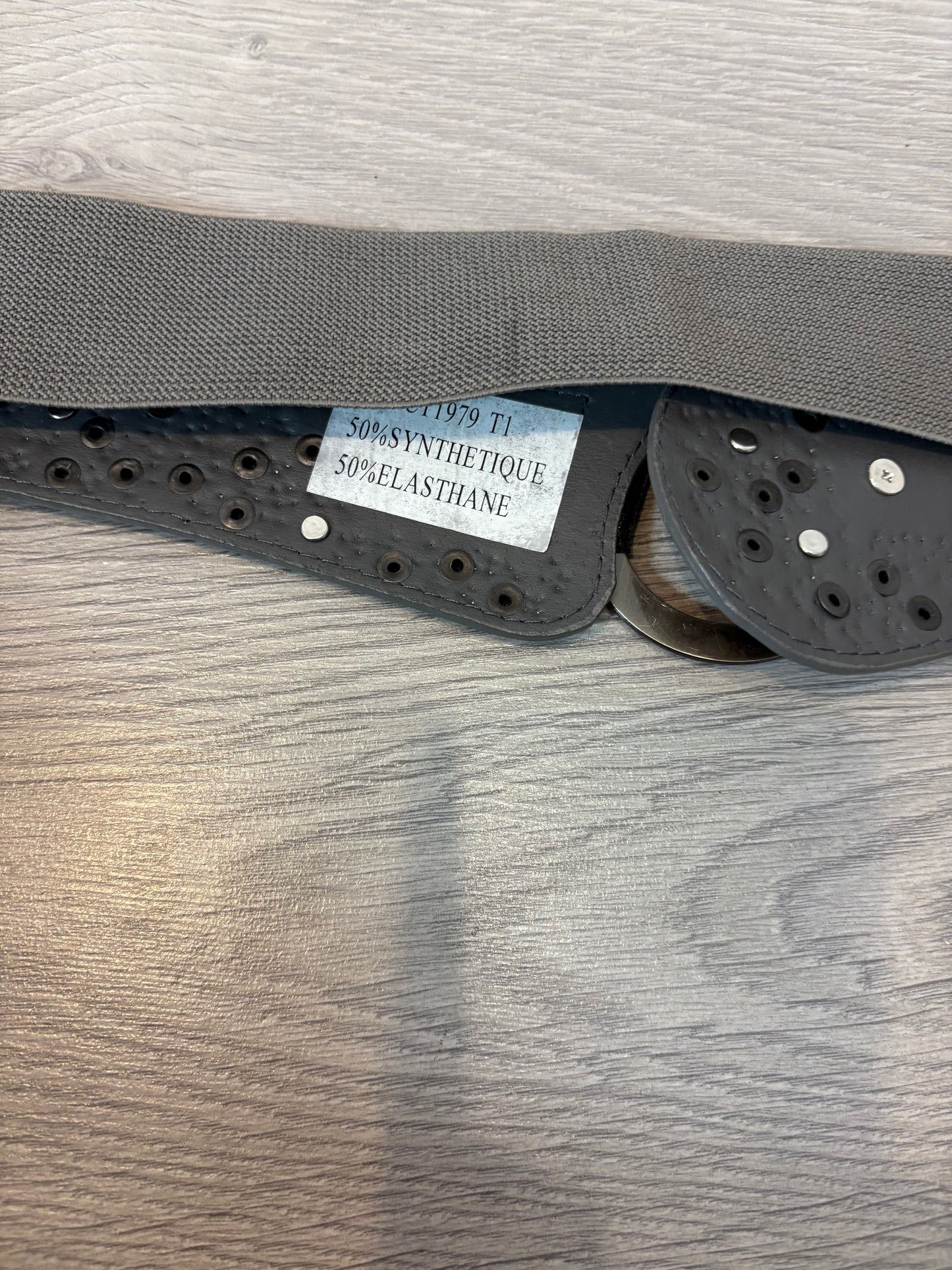 OTRAS. Cinturón semi elástico tachuelas