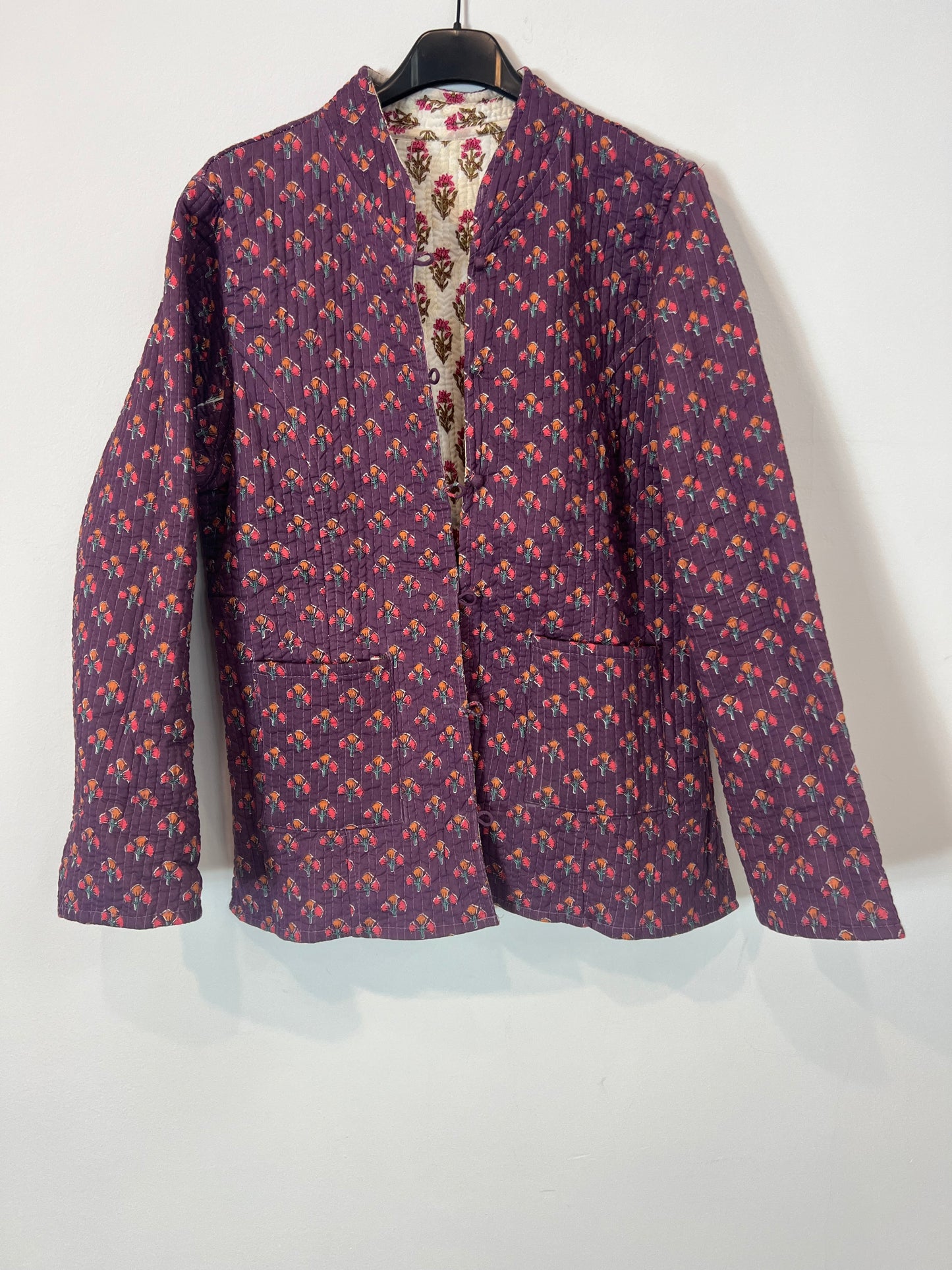 OTRAS. Chaqueta reversible flores T(u(xs/s)