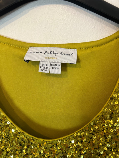 NEVER FULLY DRESSED. Top elástico lentejuelas