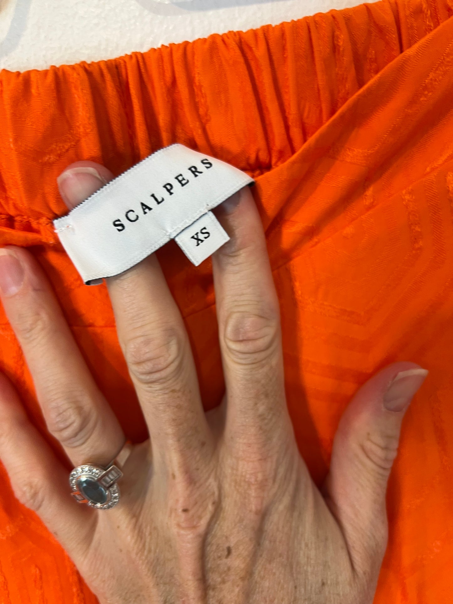 SCALPERS. Conjunto naranja estampado  T.xs/s