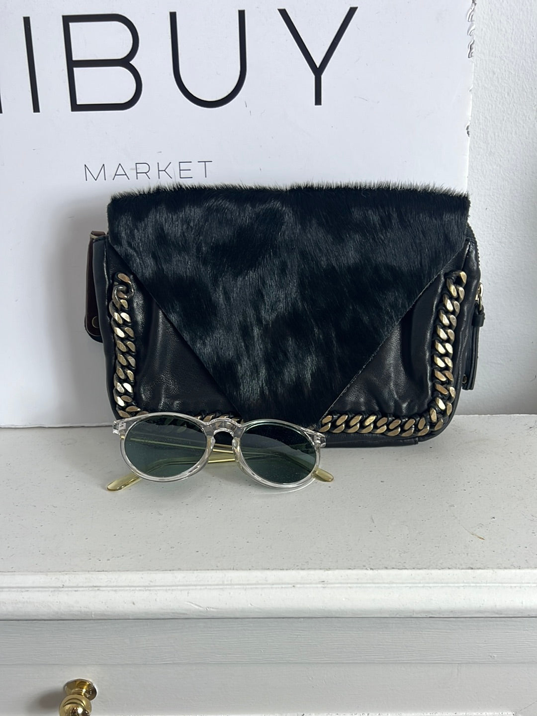 INTROPIA. Bolso de mano piel doble textura