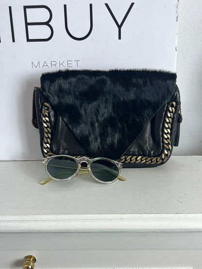 INTROPIA. Bolso de mano piel doble textura