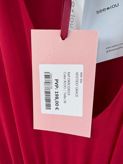 JUAN AVELLANEDA. Vestido fluido plisado