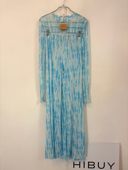 MANGO. Conjunto vestido y pantalón semitransparente
