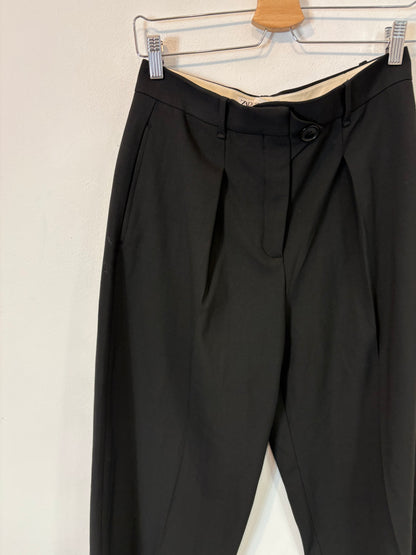 ZARA. Pantalón pinzas botón lateral