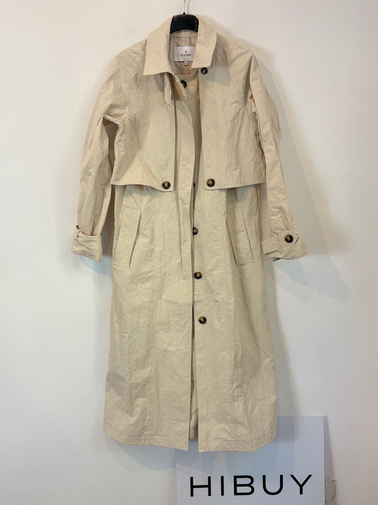 SCALPERS. Gabardina larga beige textura