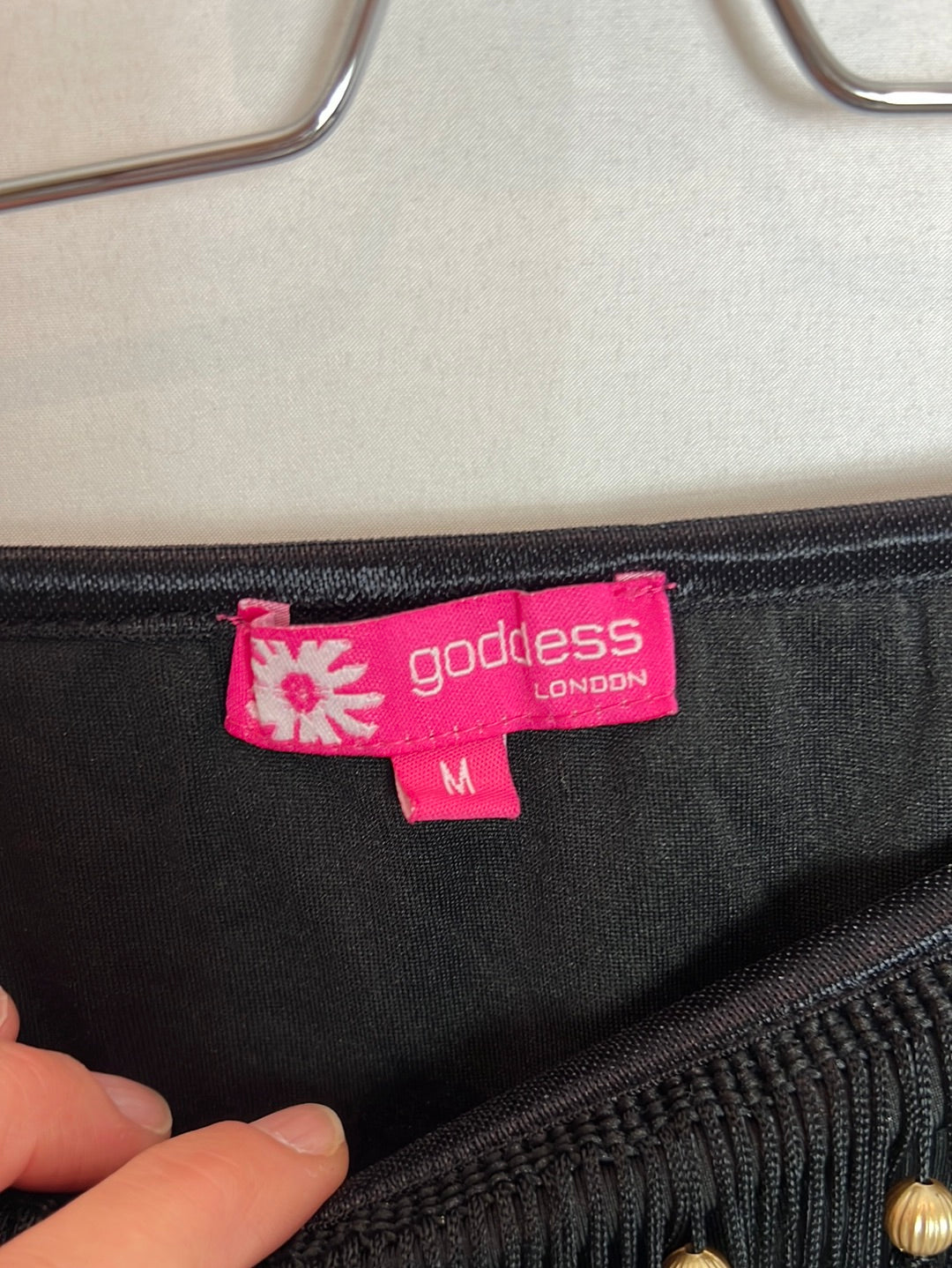 GODDESS. Short black elastic fringe skirt. TM