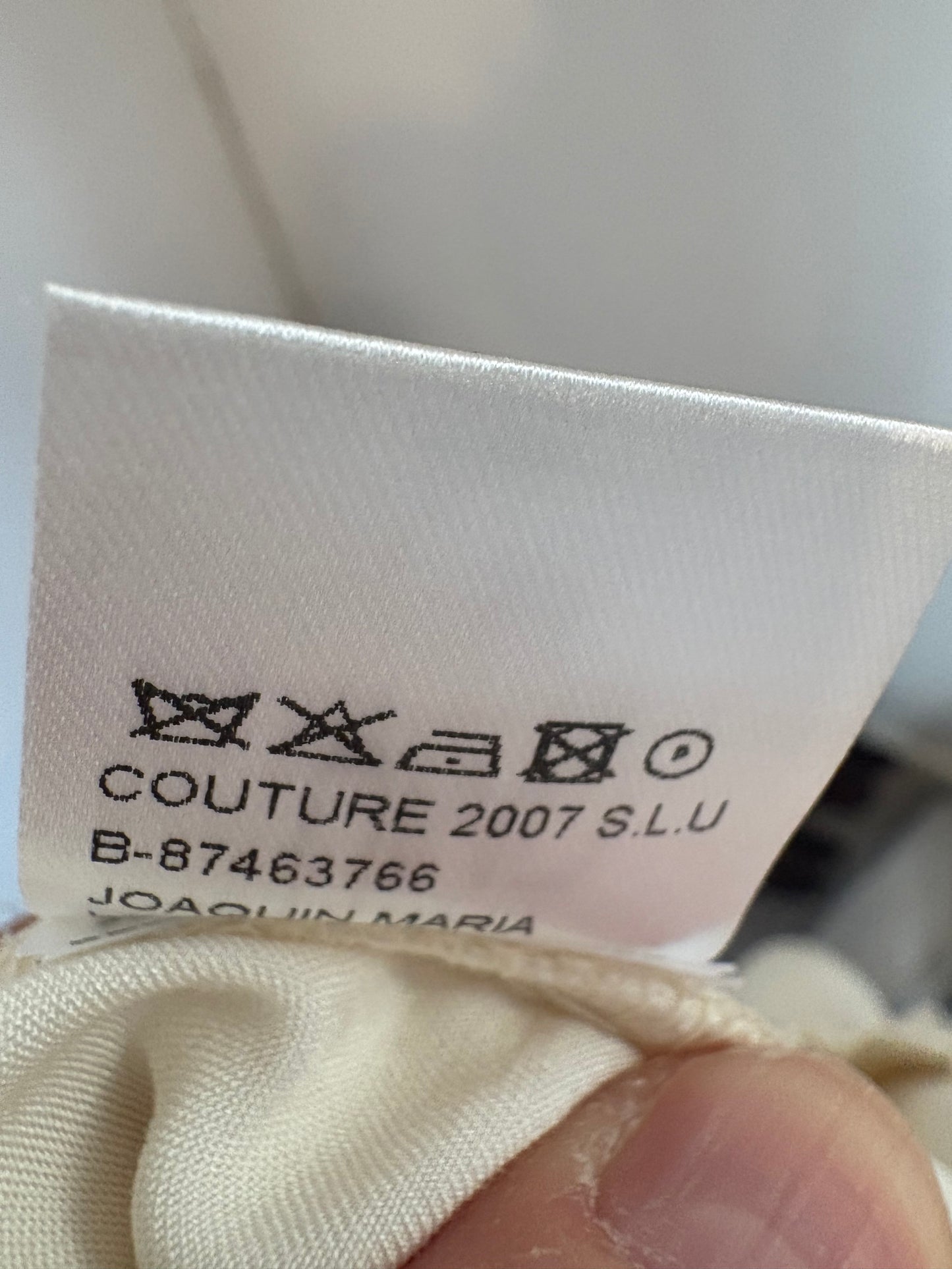 UMO COLLECTION. Pantalón satinado bolsillos. T 38