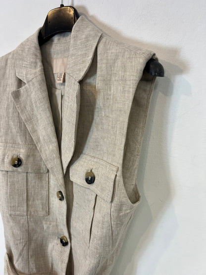 H&M. Chaleco lino bolsillos. T XS