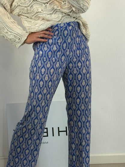 ZARA. Pantalón azul fluido abotonado
