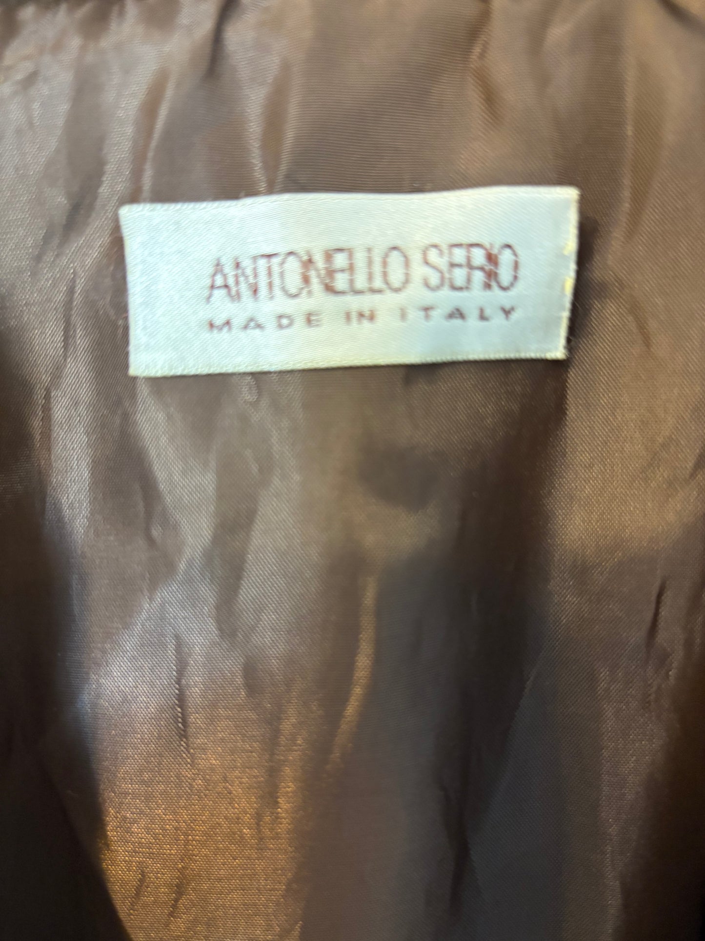 ANTONELLO SERIO. Brown leather vest with fringes. Size 40