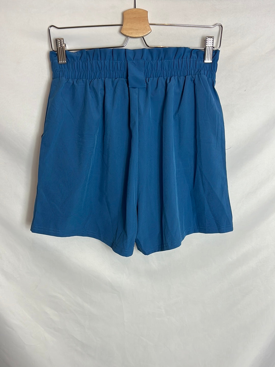 OTRAS. Bermudas azules bolsillos. T L