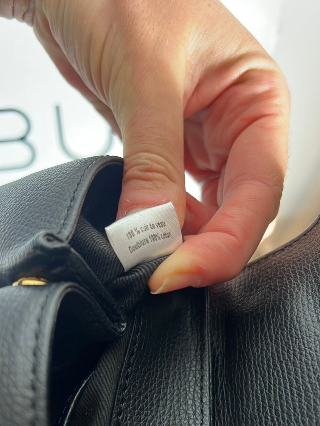 POLLENE. Black mini bag with long handle