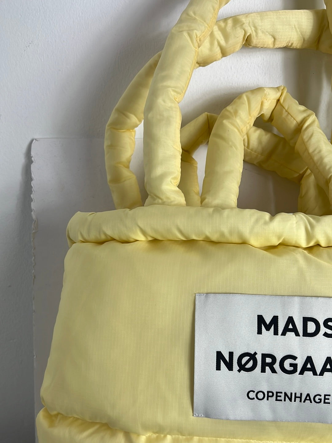 MADS NØRGAARD. Light yellow quilted bag