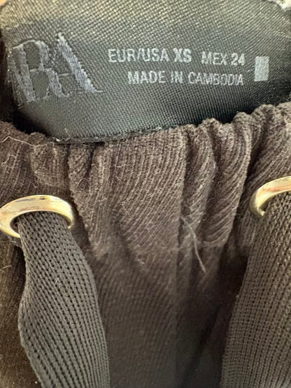 ZARA. Pantalón marrón oscuro textura